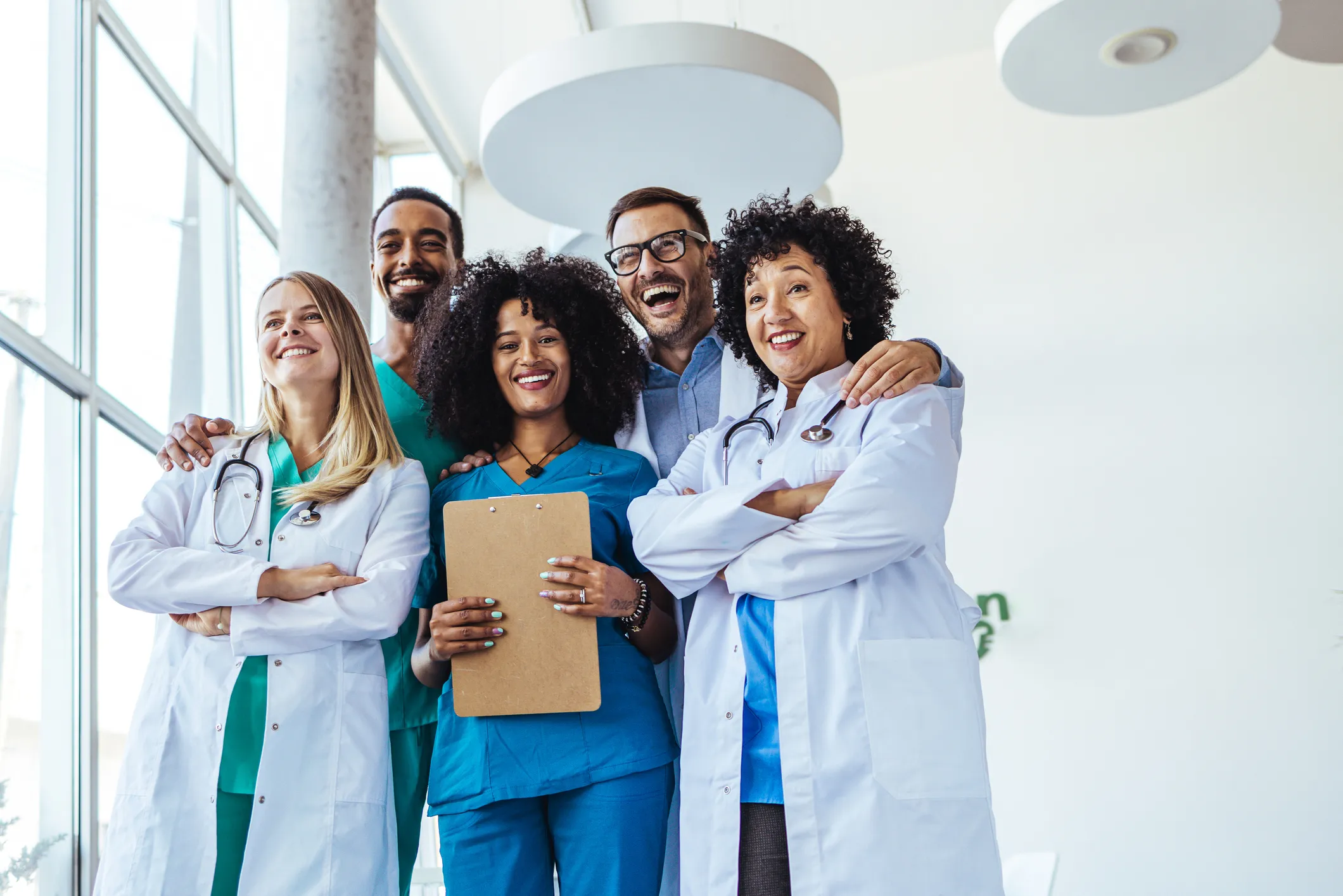 Smiling healthcare team in a hospital.